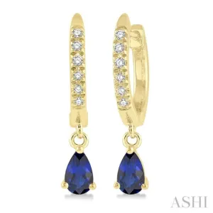 1/8 Ctw Round Cut Diamond & 5x3MM Pear Cut Sapphire Petite Fashion Huggie Earrings in 14K Yellow Gold